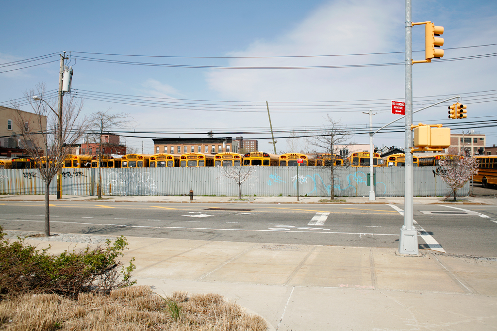 School buses Brooklyn street shot.